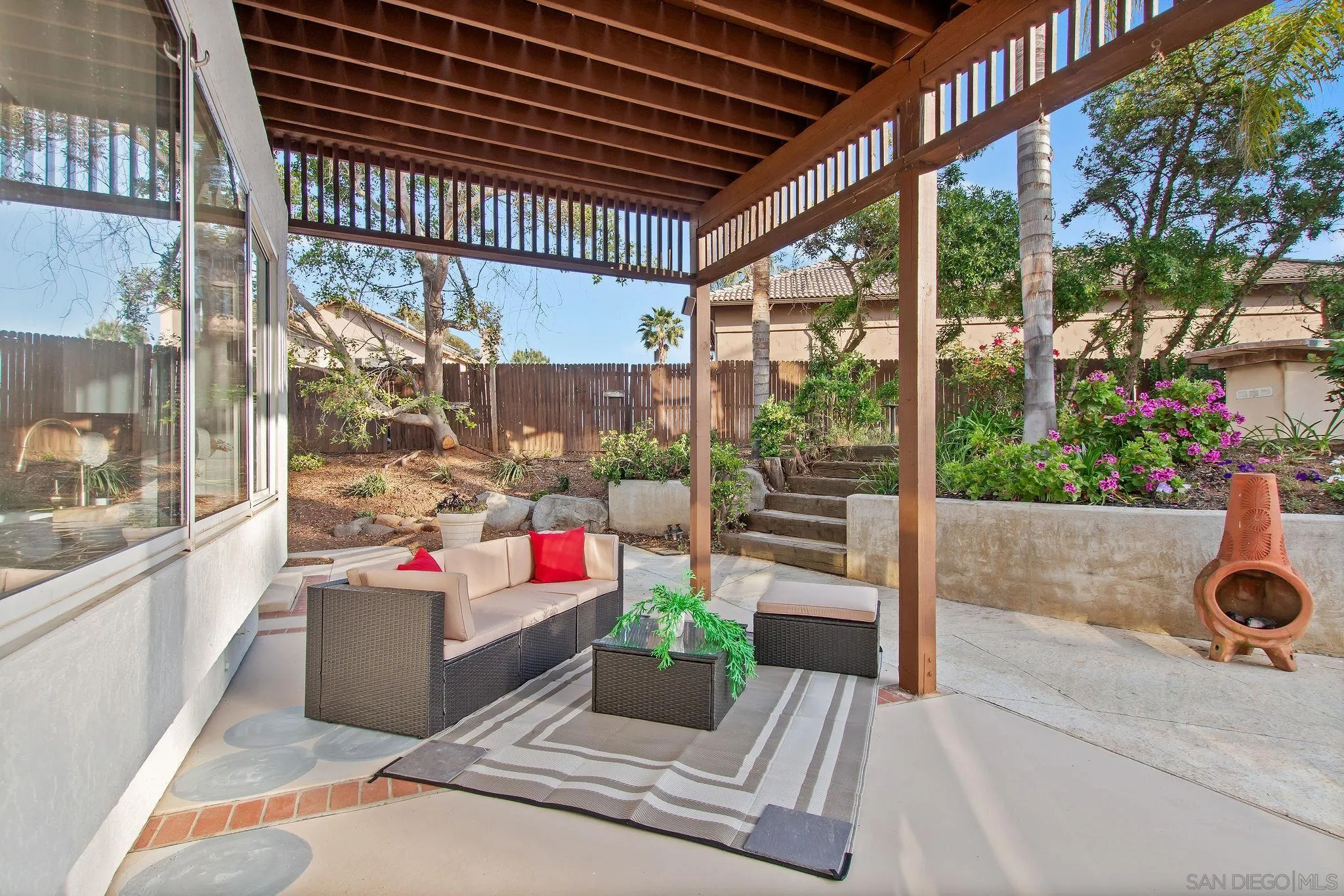 1623 Dewitt Estates Road Alpine, CA 91901 - Photo 40 of 53 a living room filled with furniture and a potted plant
