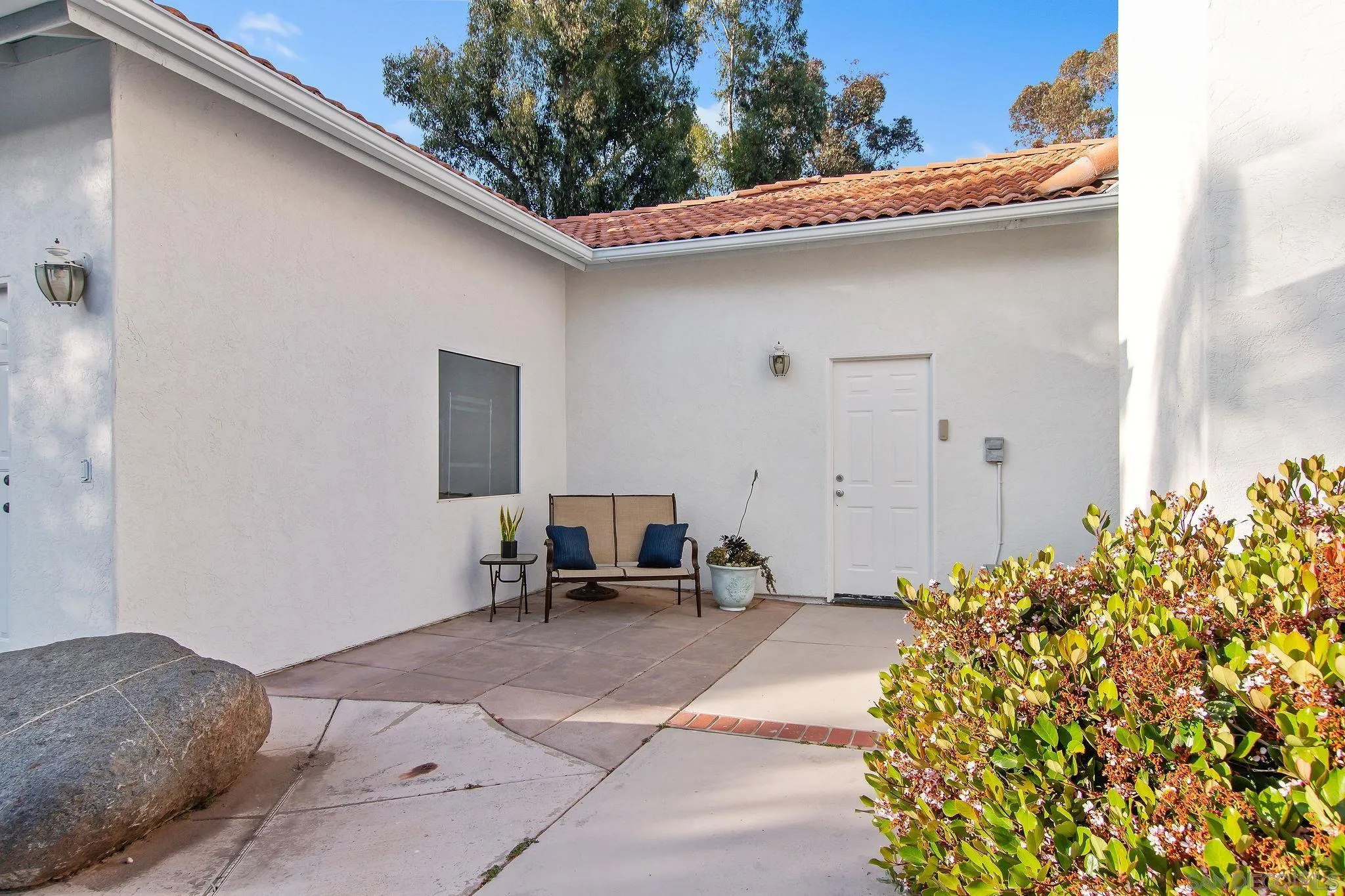 1623 Dewitt Estates Road Alpine, CA 91901 - Photo 42 of 53 a backyard of a house with outdoor seating