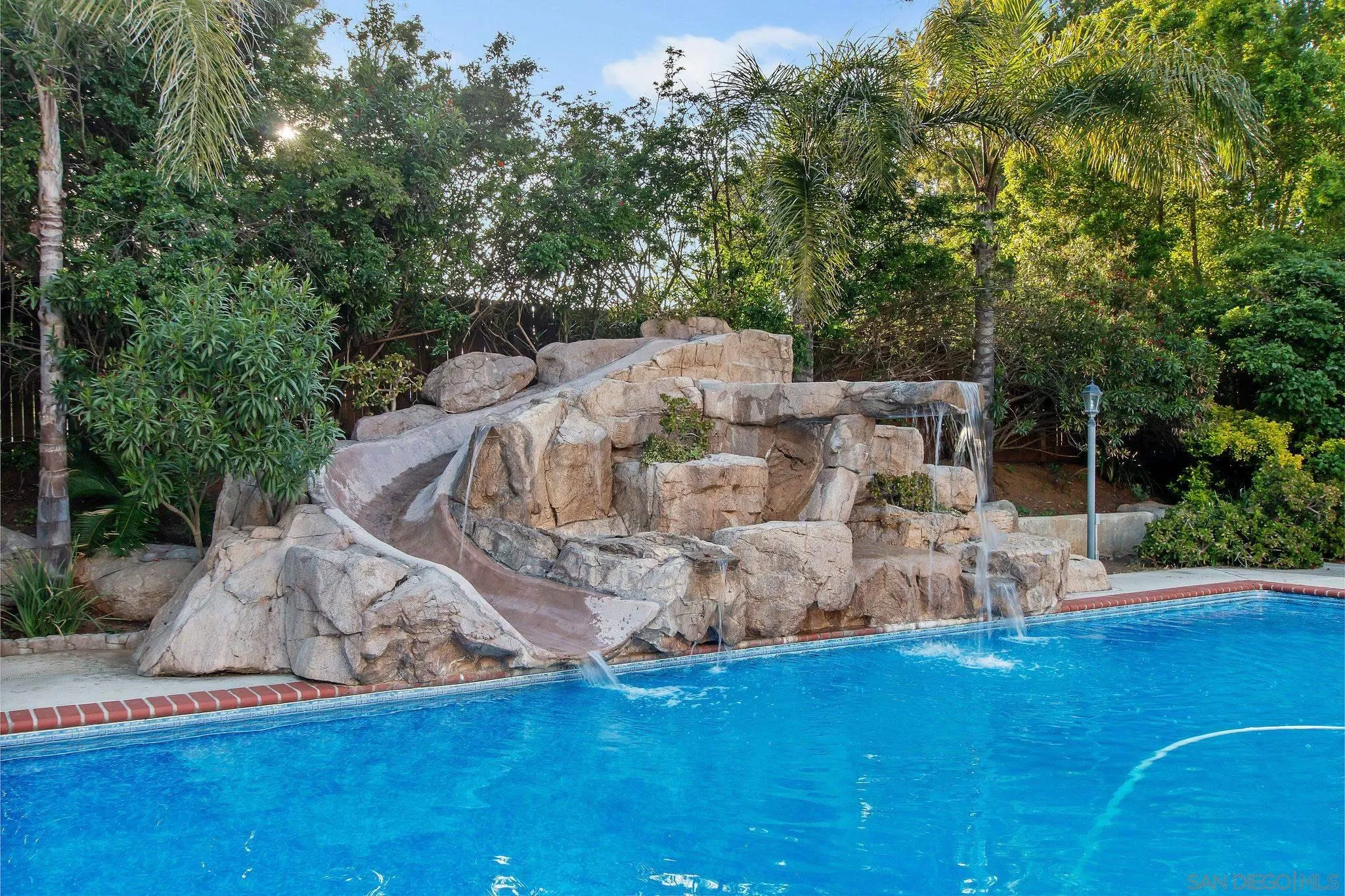 1623 Dewitt Estates Road Alpine, CA 91901 - Photo 43 of 53 a view of a backyard with swimming pool