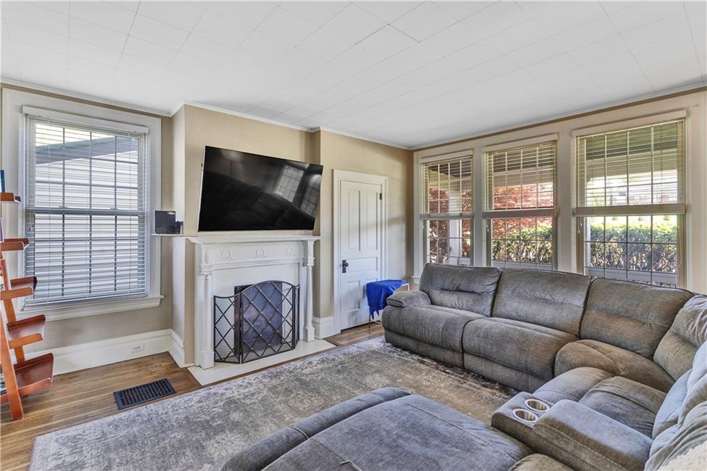 1226 Mayview Road Pittsburgh, PA 15241 - Photo 12 of 42 Warm hardwood floors and natural light create an inviting atmosphere for both everyday living and entertaining.
