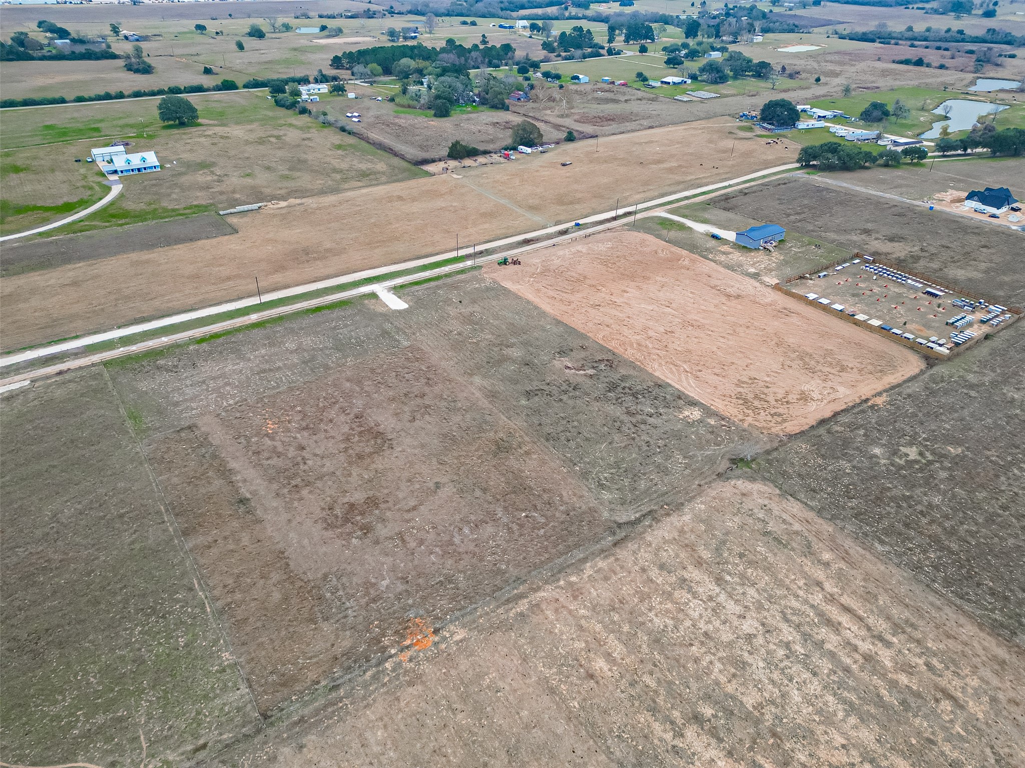 36677 3a Tract Brumlow Road Hempstead, TX 77445 - Photo 6 of 19 a backyard of a house with lots of green space and fog