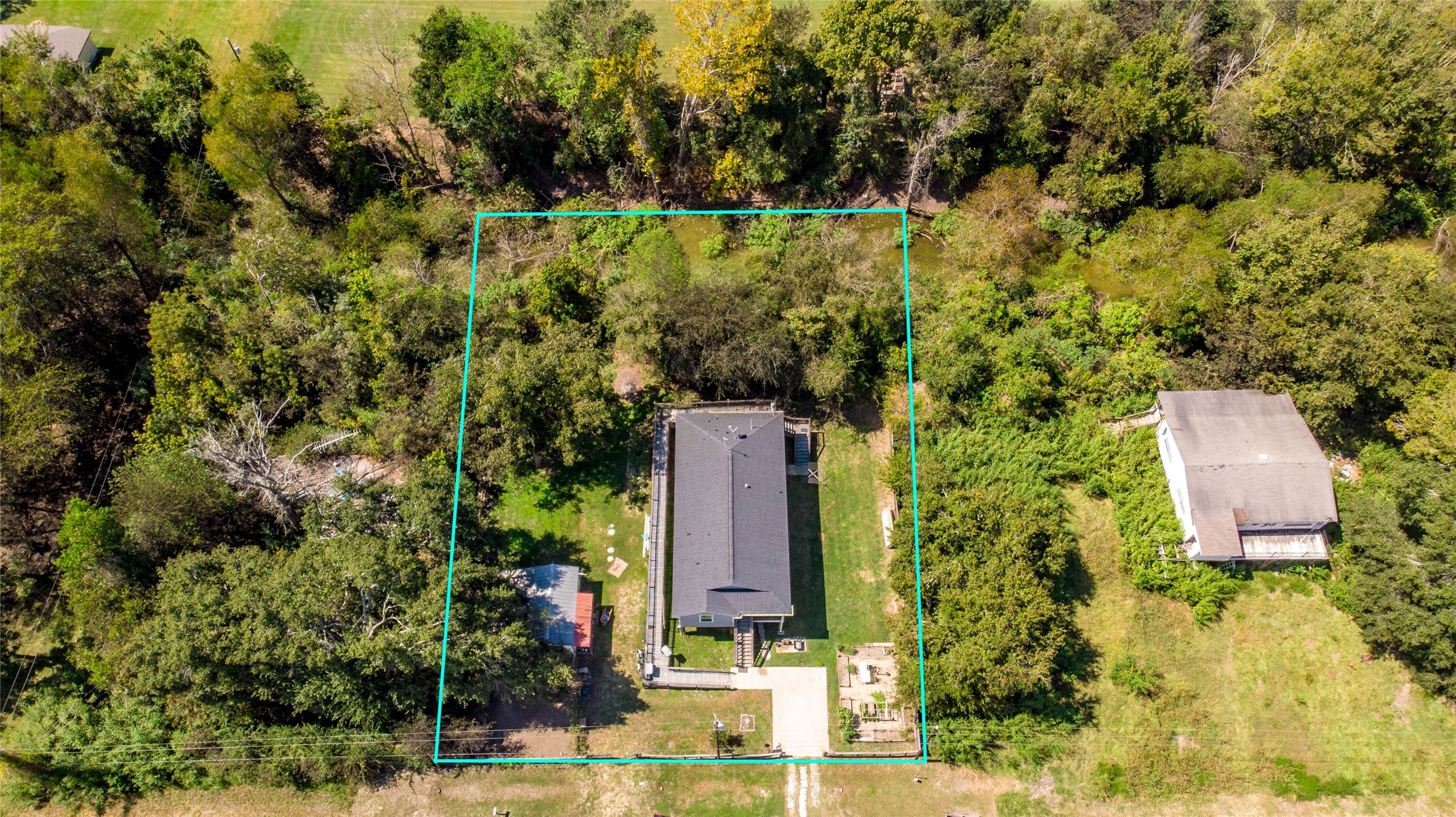 18 A R Kirk Road Trinity, TX 75862 - Photo 1 of 44 an aerial view of a house with a yard basket ball court and outdoor seating