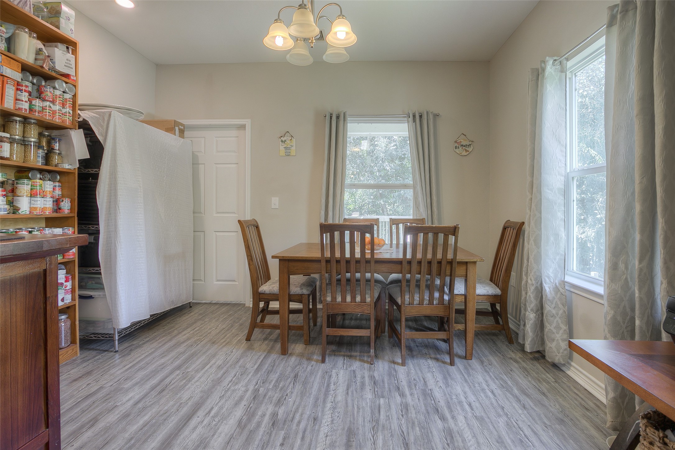 18 A R Kirk Road Trinity, TX 75862 - Photo 16 of 44 a view of a dining room with furniture and wooden floor