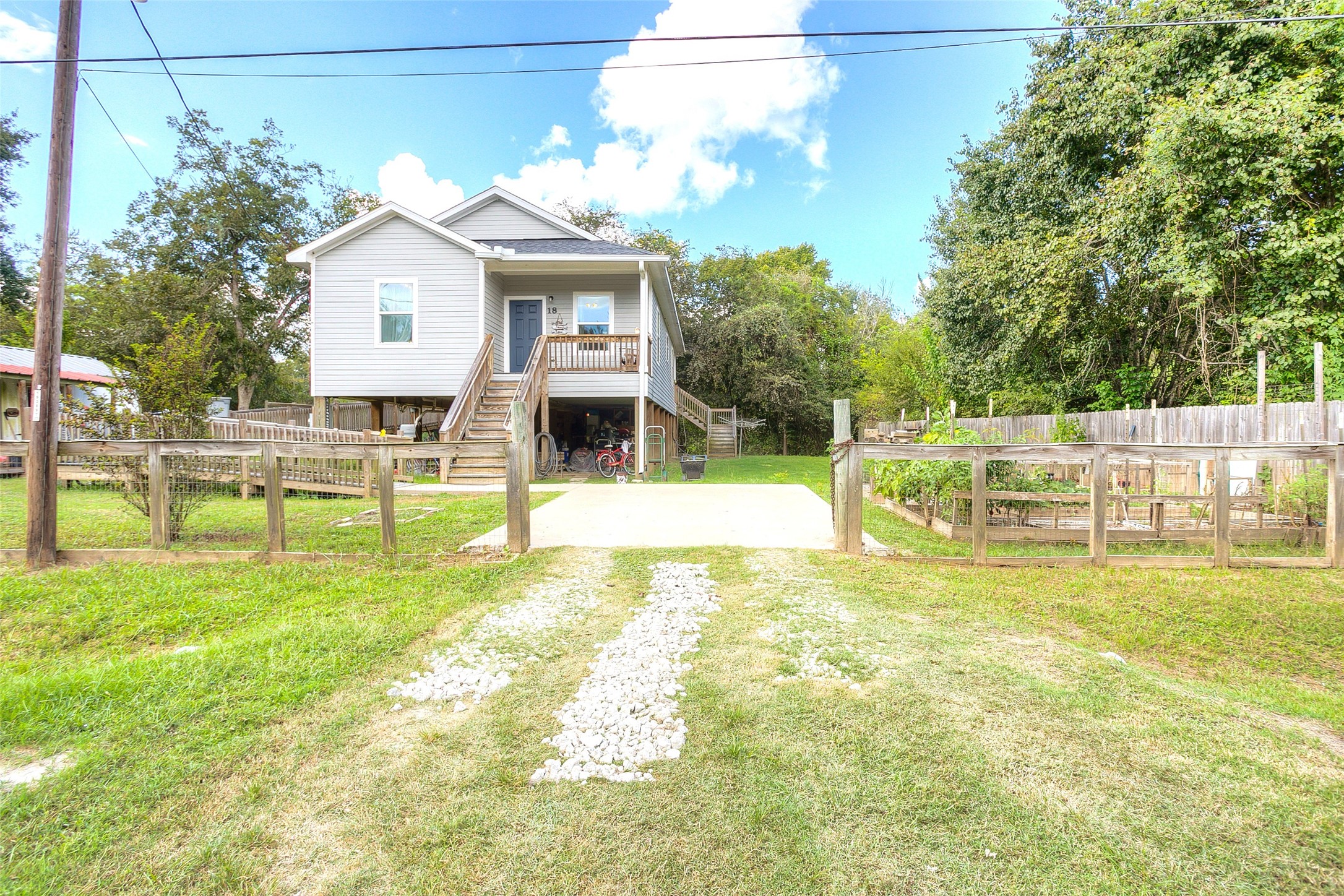 18 A R Kirk Road Trinity, TX 75862 - Photo 3 of 44 a view of a house with swimming pool and a yard
