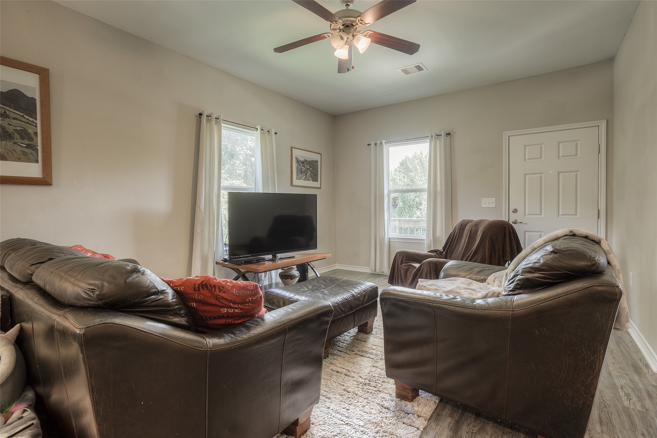 18 A R Kirk Road Trinity, TX 75862 - Photo 8 of 44 a living room with furniture and a flat screen tv