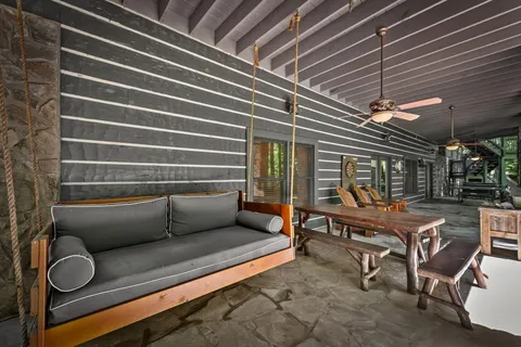 a outdoor dining space with furniture and outdoor space