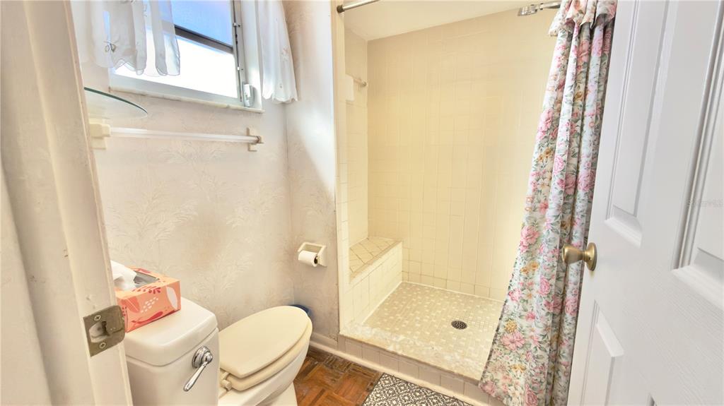 12985 116th Street Largo, FL 33778 - Photo 17 of 28 a bathroom with a sink and toilet