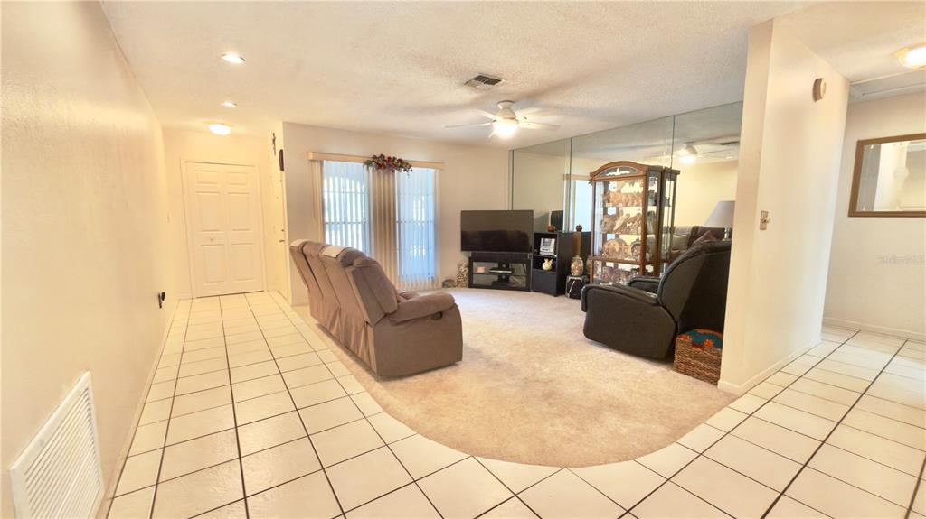 12985 116th Street Largo, FL 33778 - Photo 5 of 28 a living room with furniture