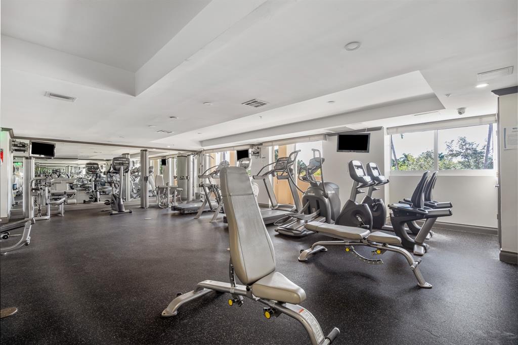 2011 North Ocean Boulevard, Unit 302 Fort Lauderdale, FL 33305 - Photo 29 of 45 a view of a room with gym equipment