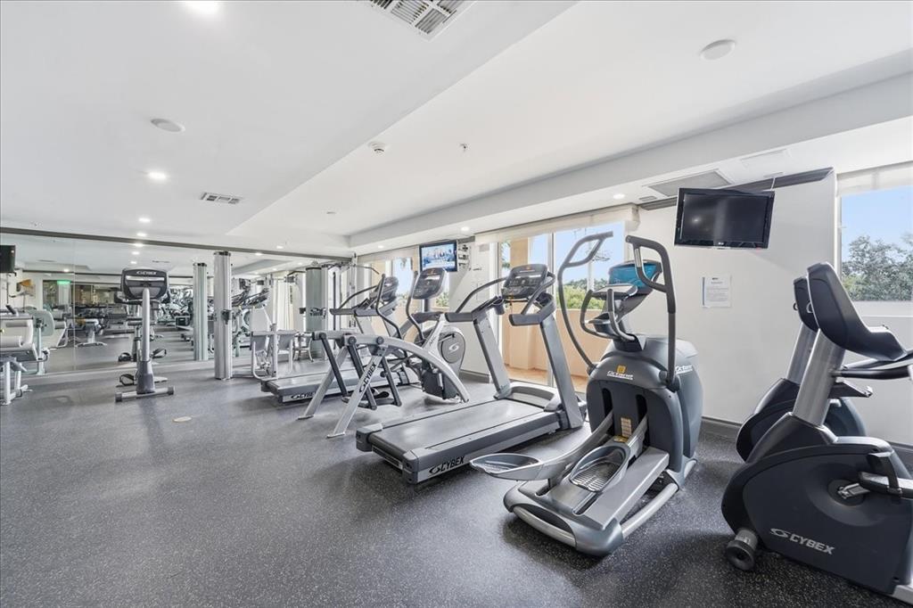 2011 North Ocean Boulevard, Unit 302 Fort Lauderdale, FL 33305 - Photo 30 of 45 a view of a room with gym equipment