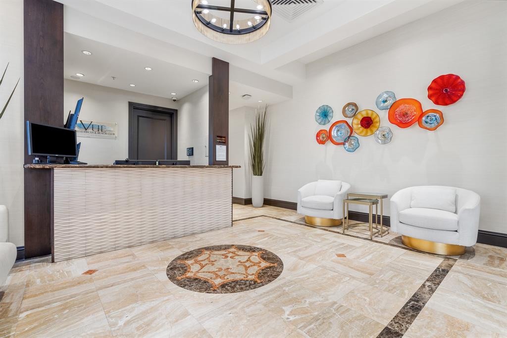 2011 North Ocean Boulevard, Unit 302 Fort Lauderdale, FL 33305 - Photo 6 of 45 a bedroom with a bed and a couch