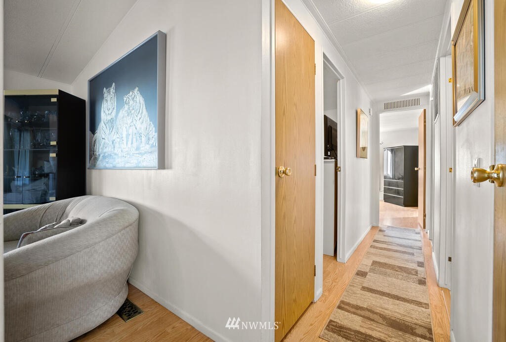 201 Union Avenue Southeast, Unit 224 Renton, WA 98059 - Photo 15 of 23 a living room with a couch and a window