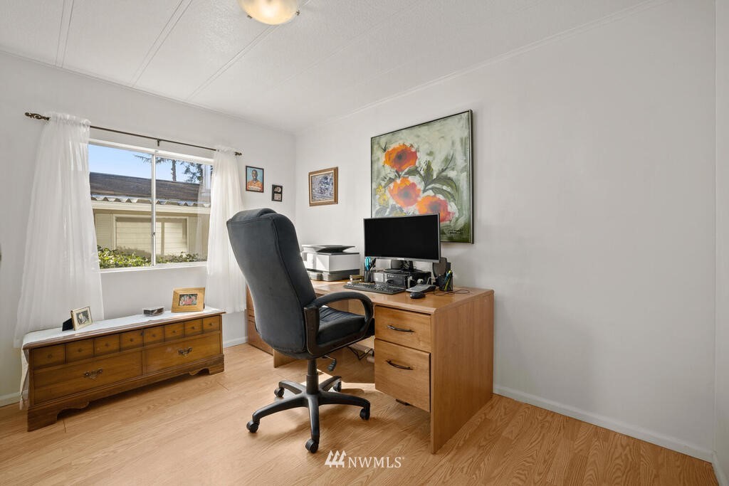 201 Union Avenue Southeast, Unit 224 Renton, WA 98059 - Photo 21 of 23 a view of a workspace with furniture and a window