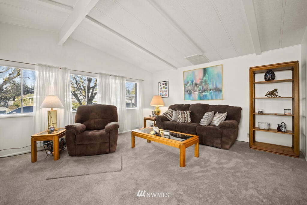 201 Union Avenue Southeast, Unit 224 Renton, WA 98059 - Photo 10 of 23 a living room with furniture and a window