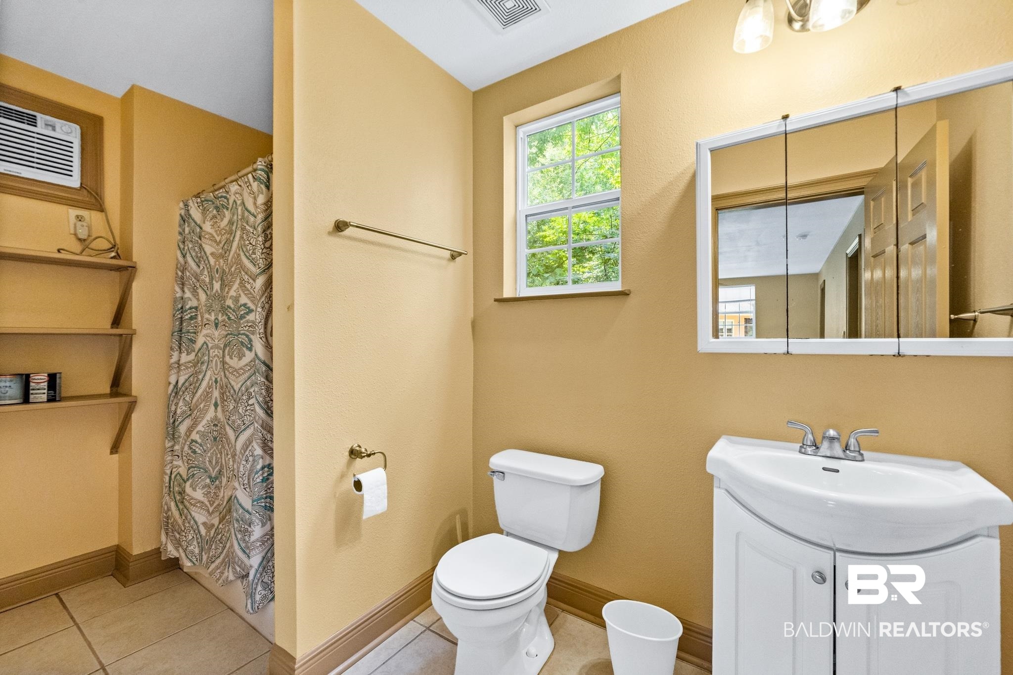 8321 Dixon Road Bay Minette, AL 36507 - Photo 60 of 79 Bathroom with tile patterned floors, vanity, and toilet