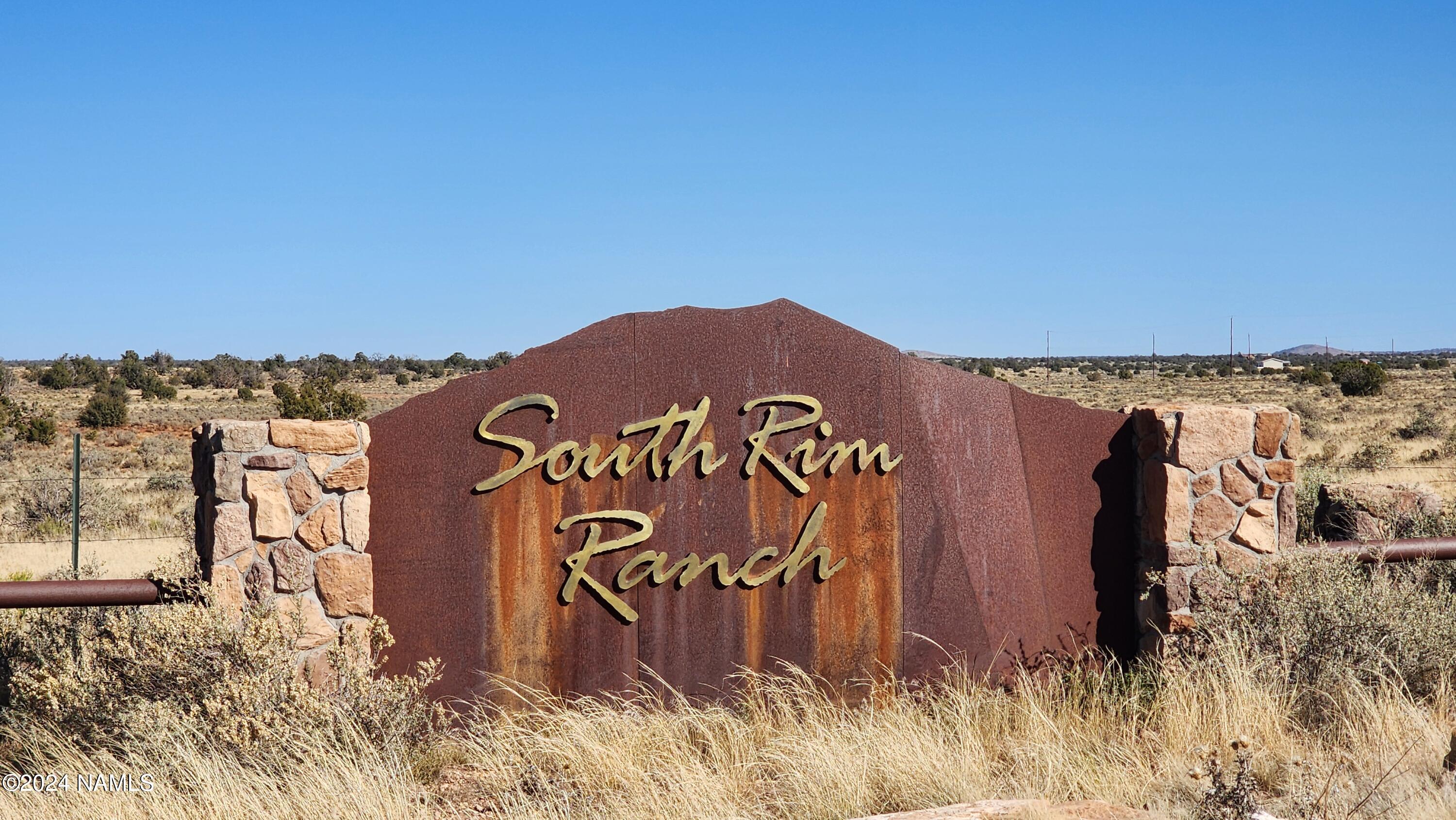 3433 Red Butte Road Williams, AZ 86046 - Photo 22 of 22 a view of a sign board with building in background