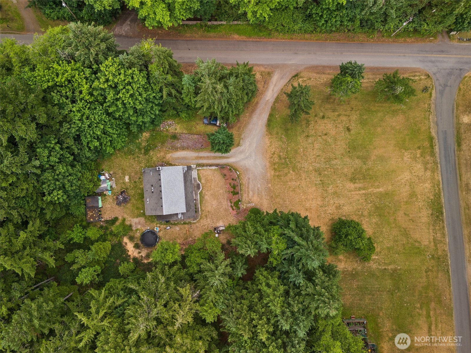 1471 Southeast Binns Swiger Loop Road Shelton, WA 98584 - Photo 4 of 13 an aerial view of a residential houses with outdoor space and trees