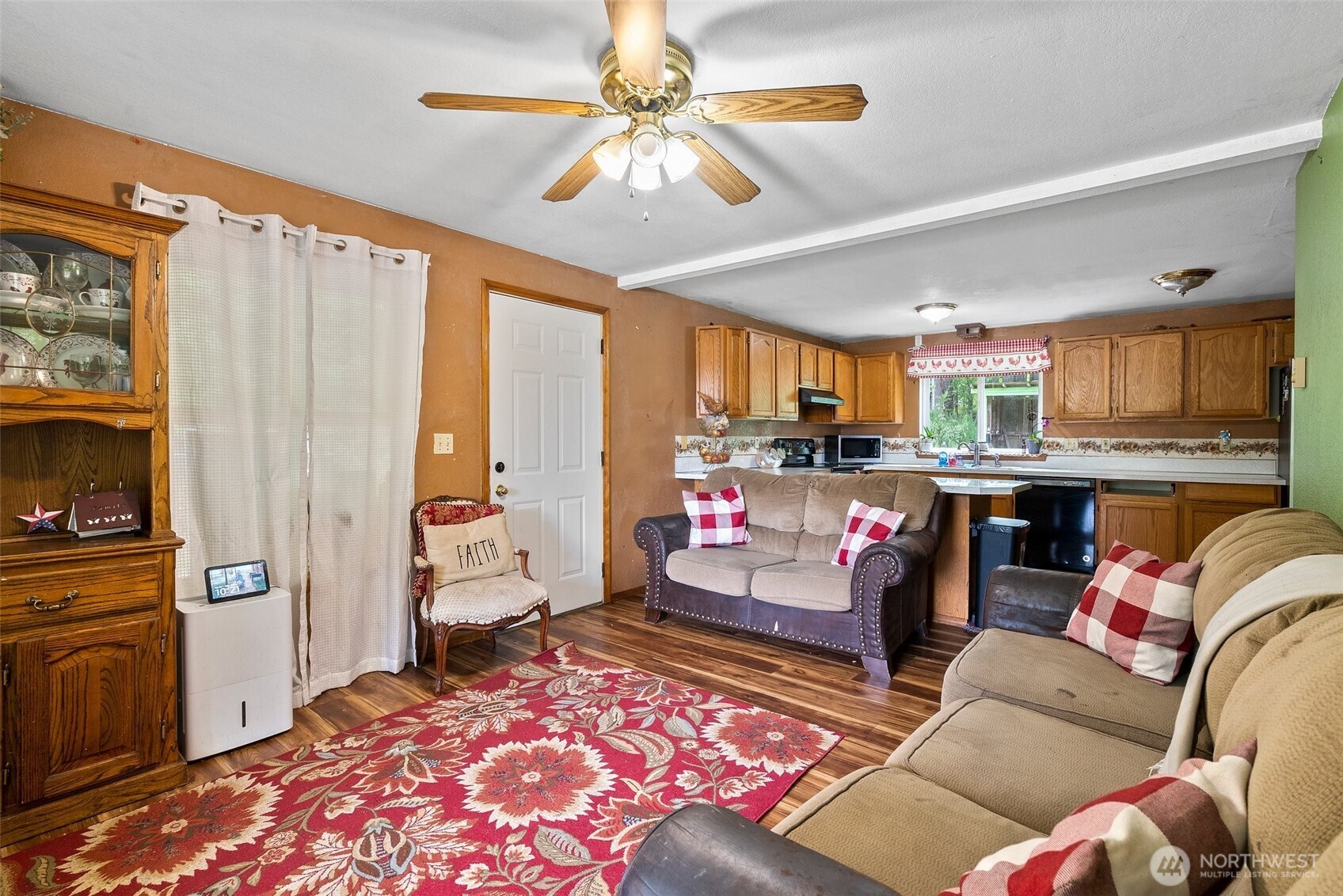 1471 Southeast Binns Swiger Loop Road Shelton, WA 98584 - Photo 10 of 13 a living room with furniture and a flat screen tv
