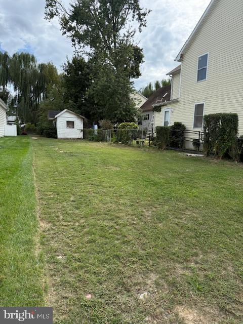 562 Girard Street Havre de Grace, MD 21078 - Photo 2 of 20 a front view of a house with a yard and trees
