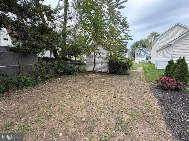 562 Girard Street Havre de Grace, MD 21078 - Photo 10 of 20 a view of a house with a yard and garage