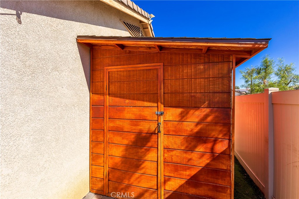 31529 Amsterdam Road Winchester, CA 92596 - Photo 29 of 35 Additional storage shed on other side yard. Includes door on either end.
