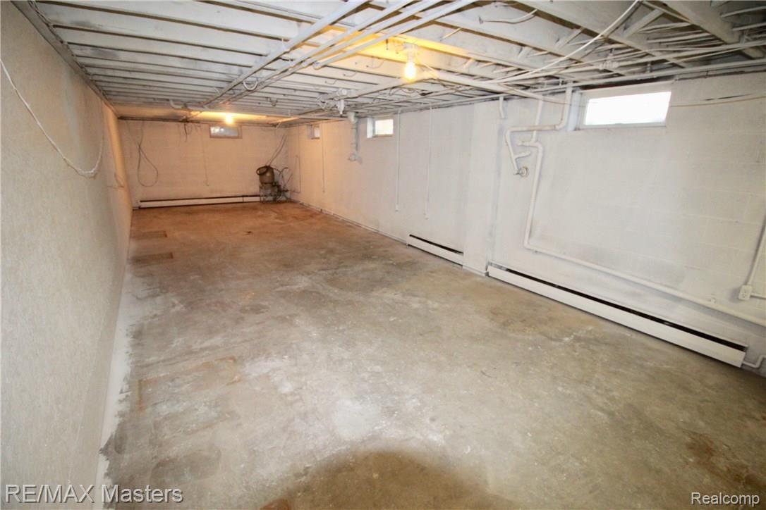 2070 North Raisinville Road Monroe, MI 48162 - Photo 16 of 25 Full basement just waiting for you and your family to set up and use as rec room, storage, workshop or anything in between.