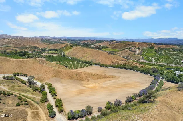 a view of a lake with mountains in the background