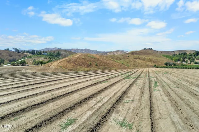 a view of a lake with mountains in the background