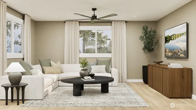 a living room with furniture and a large window