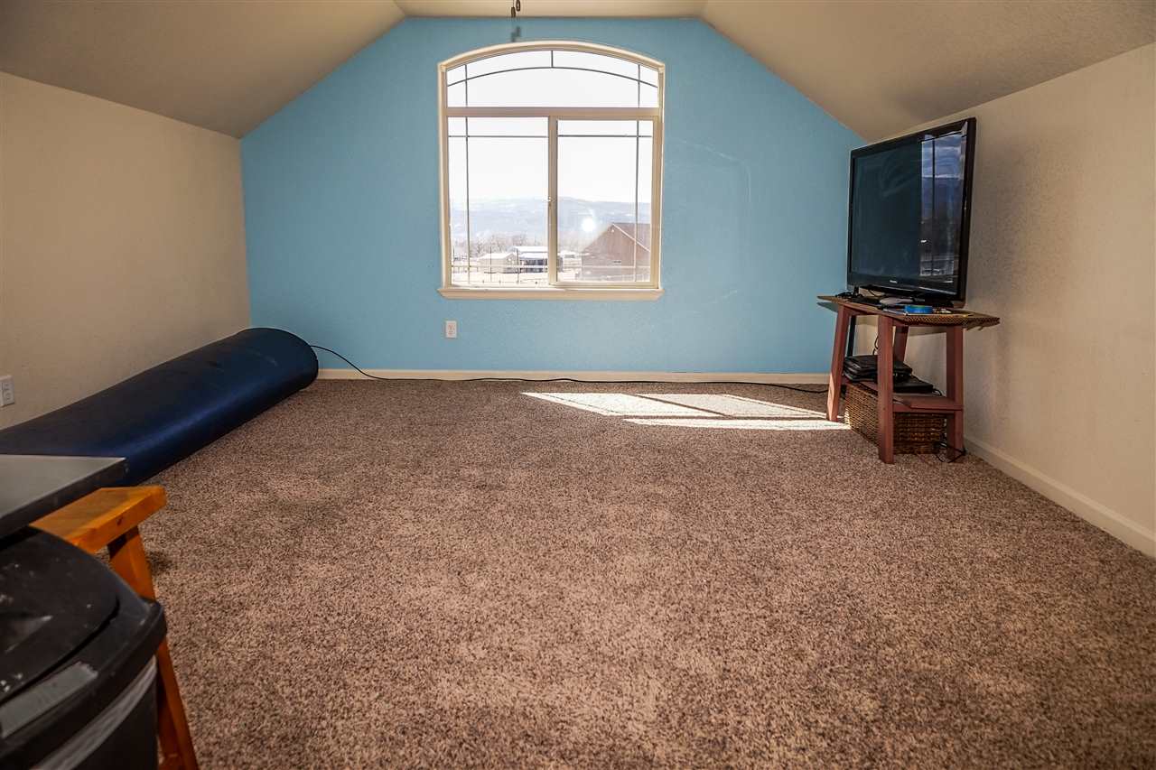 1860 Golden Ranch Road Fruita, CO 81521 - Photo 19 of 27 a view of livingroom with natural light