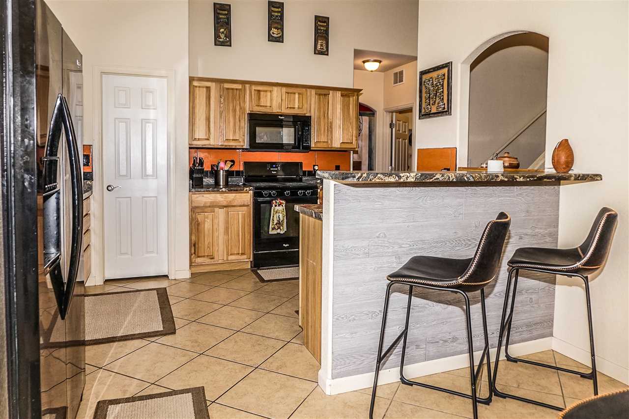 1860 Golden Ranch Road Fruita, CO 81521 - Photo 5 of 27 a view of kitchen with furniture stove and chair