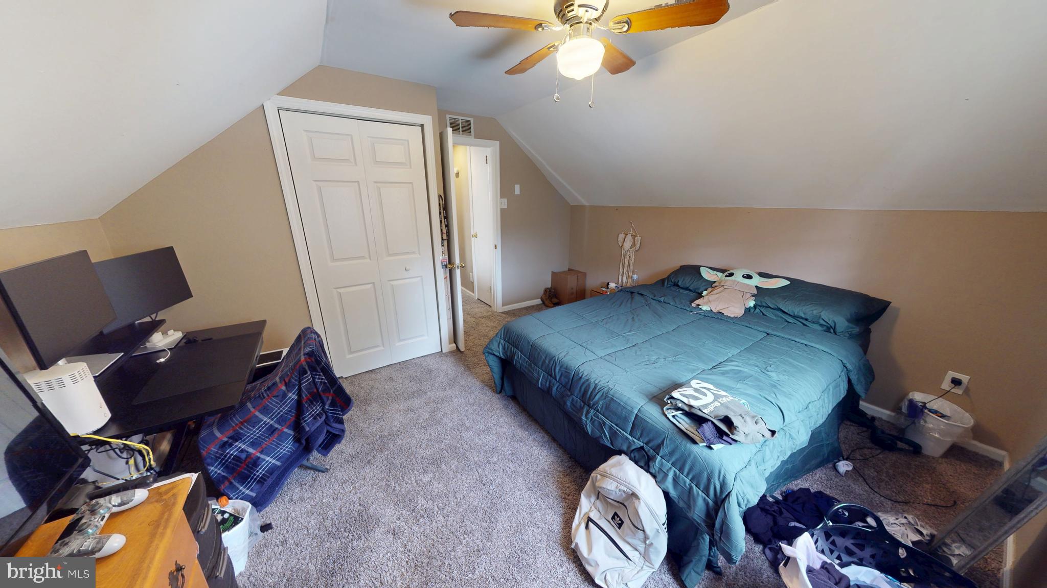 13 Cordelia Avenue Westville, NJ 08093 - Photo 14 of 25 a bedroom with a bed and wooden floor