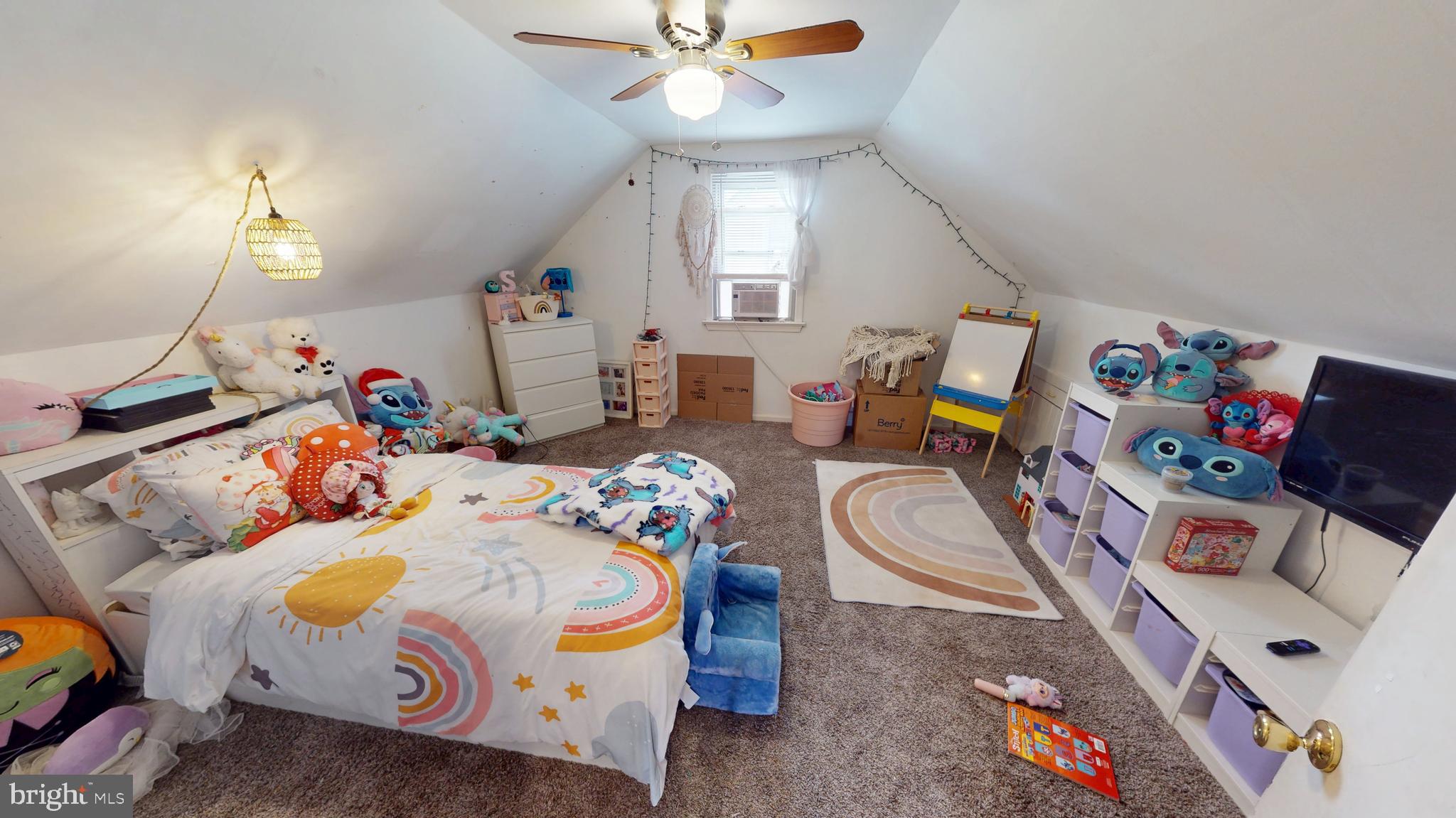 13 Cordelia Avenue Westville, NJ 08093 - Photo 16 of 25 a bedroom with furniture and a chandelier