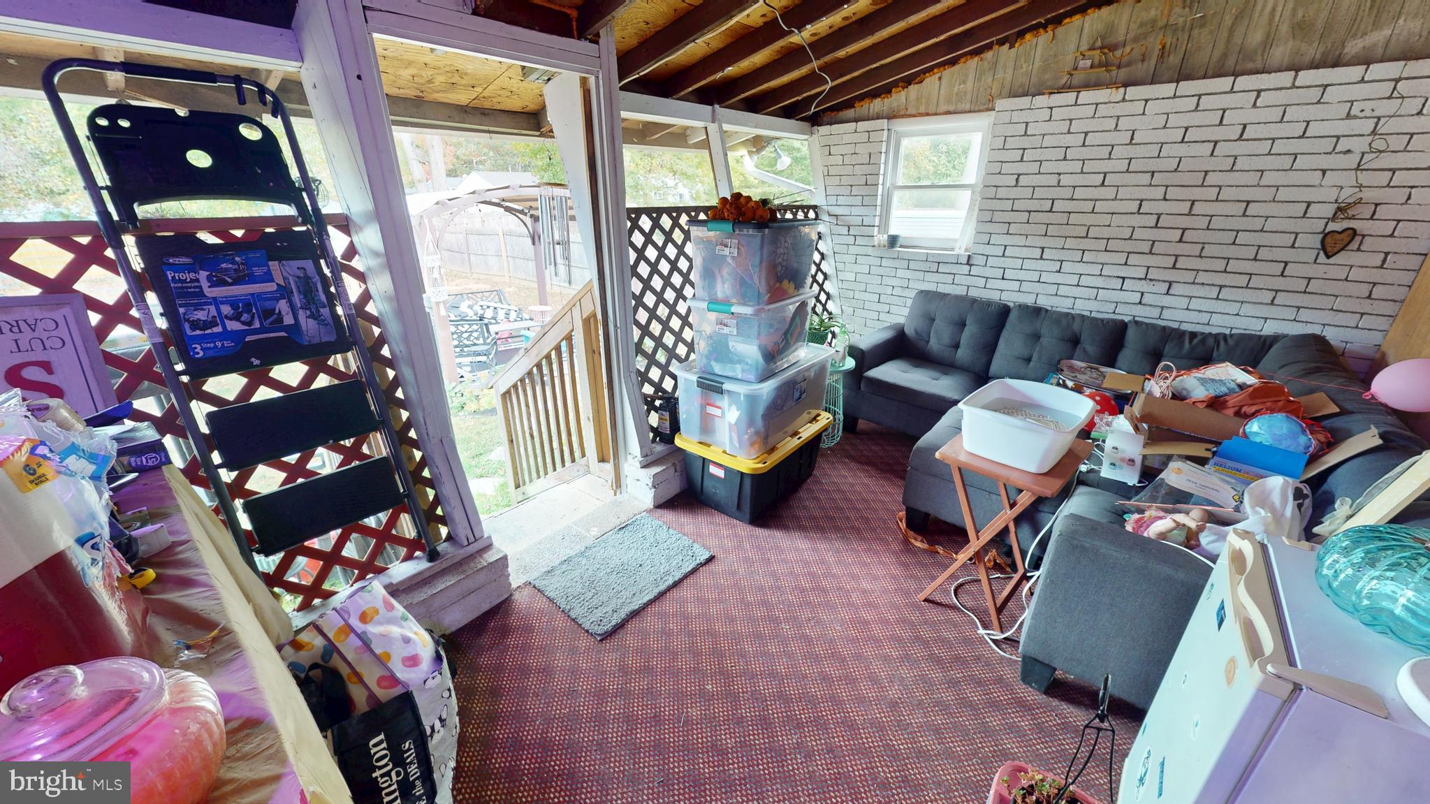 13 Cordelia Avenue Westville, NJ 08093 - Photo 19 of 25 a reading room with furniture and a fireplace
