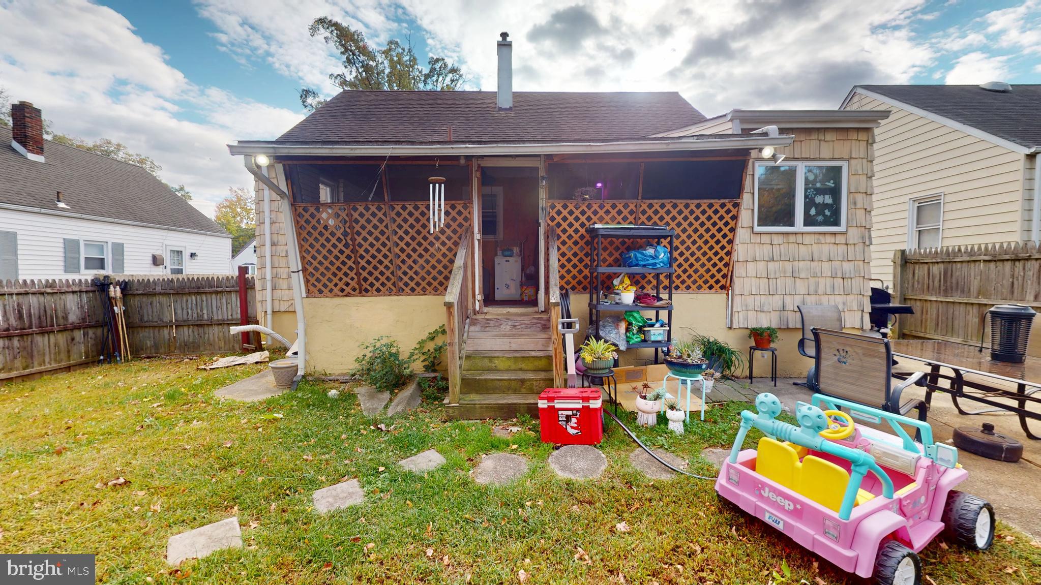 13 Cordelia Avenue Westville, NJ 08093 - Photo 20 of 25 a front view of house with yard and seating area