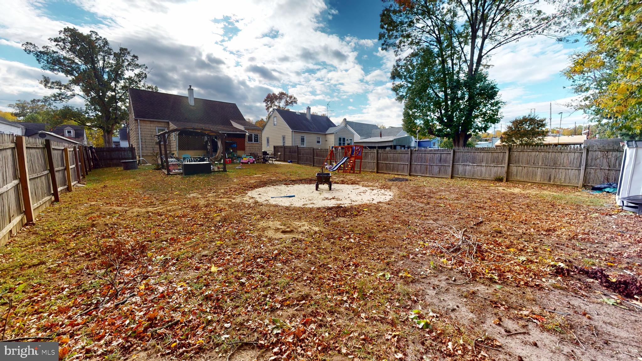 13 Cordelia Avenue Westville, NJ 08093 - Photo 23 of 25 a swimming pool with some trees in the background