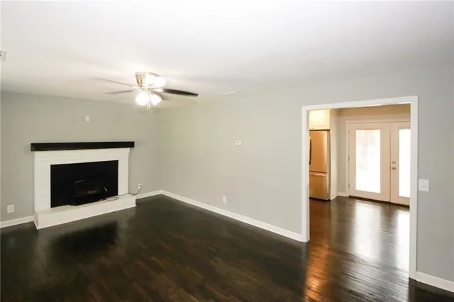 a kitchen with stainless steel appliances granite countertop a stove a microwave and a sink