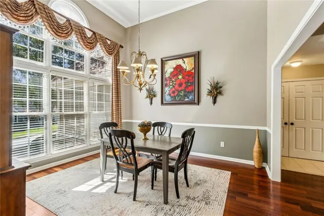 a view of a livingroom with workspace and furniture