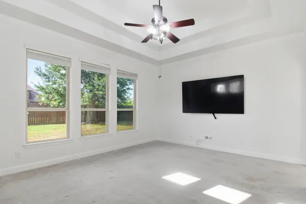 a living room with flat screen tv
