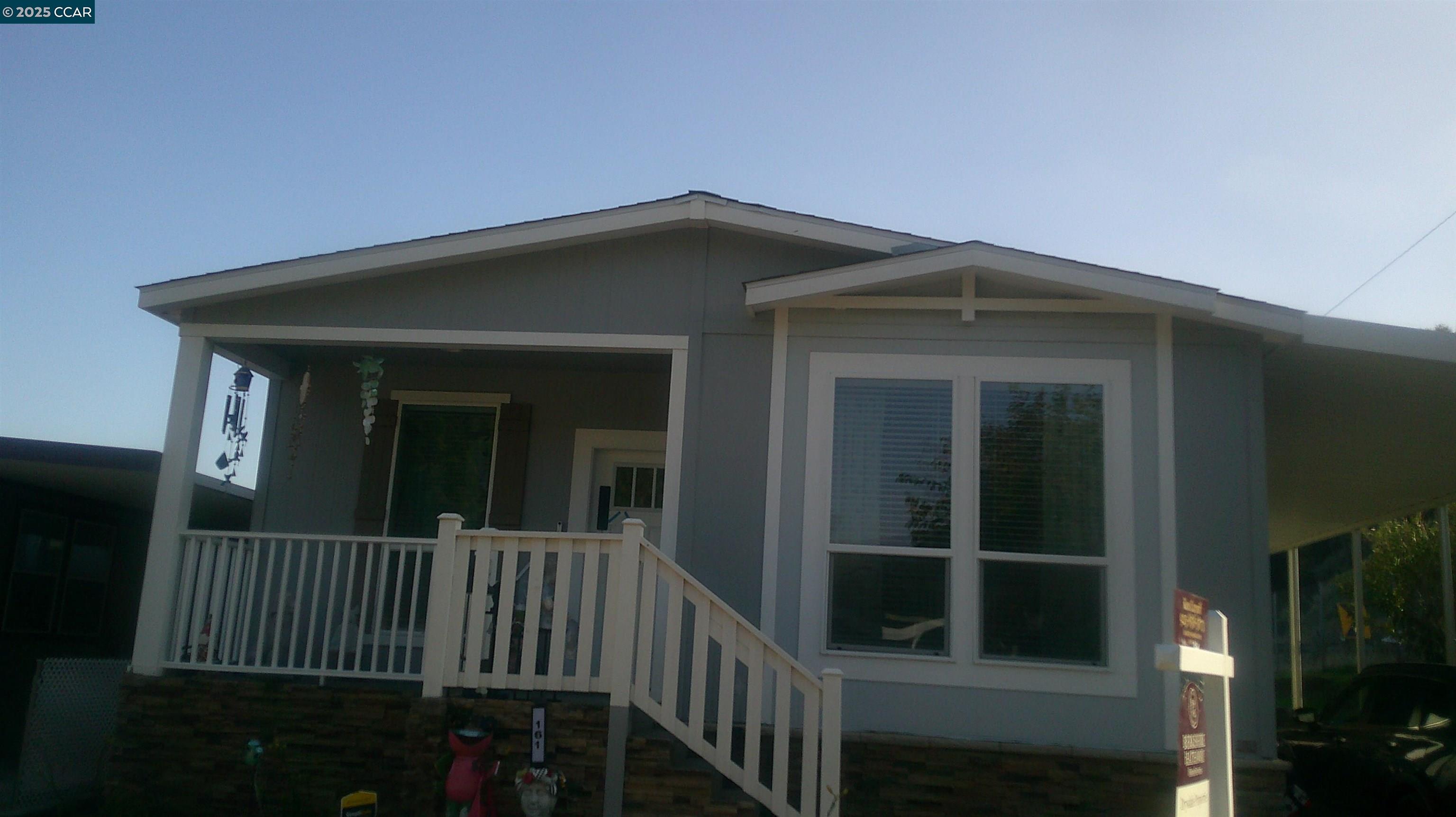a view of a house with a porch