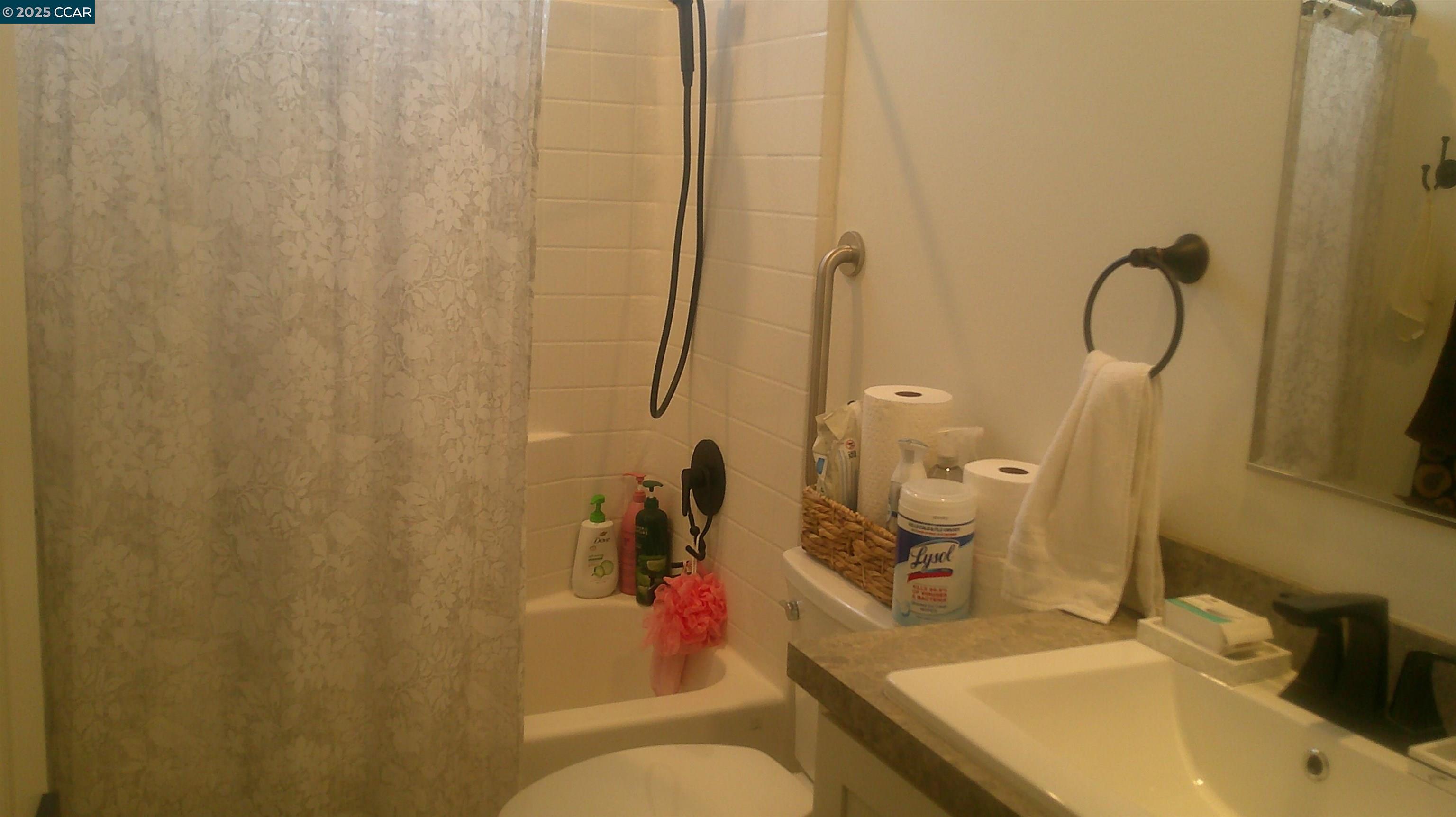 16711 Marsh Creek Road, Unit 161 Clayton, CA 94517 - Photo 13 of 25 a bathroom with a sink and mirror with toilet