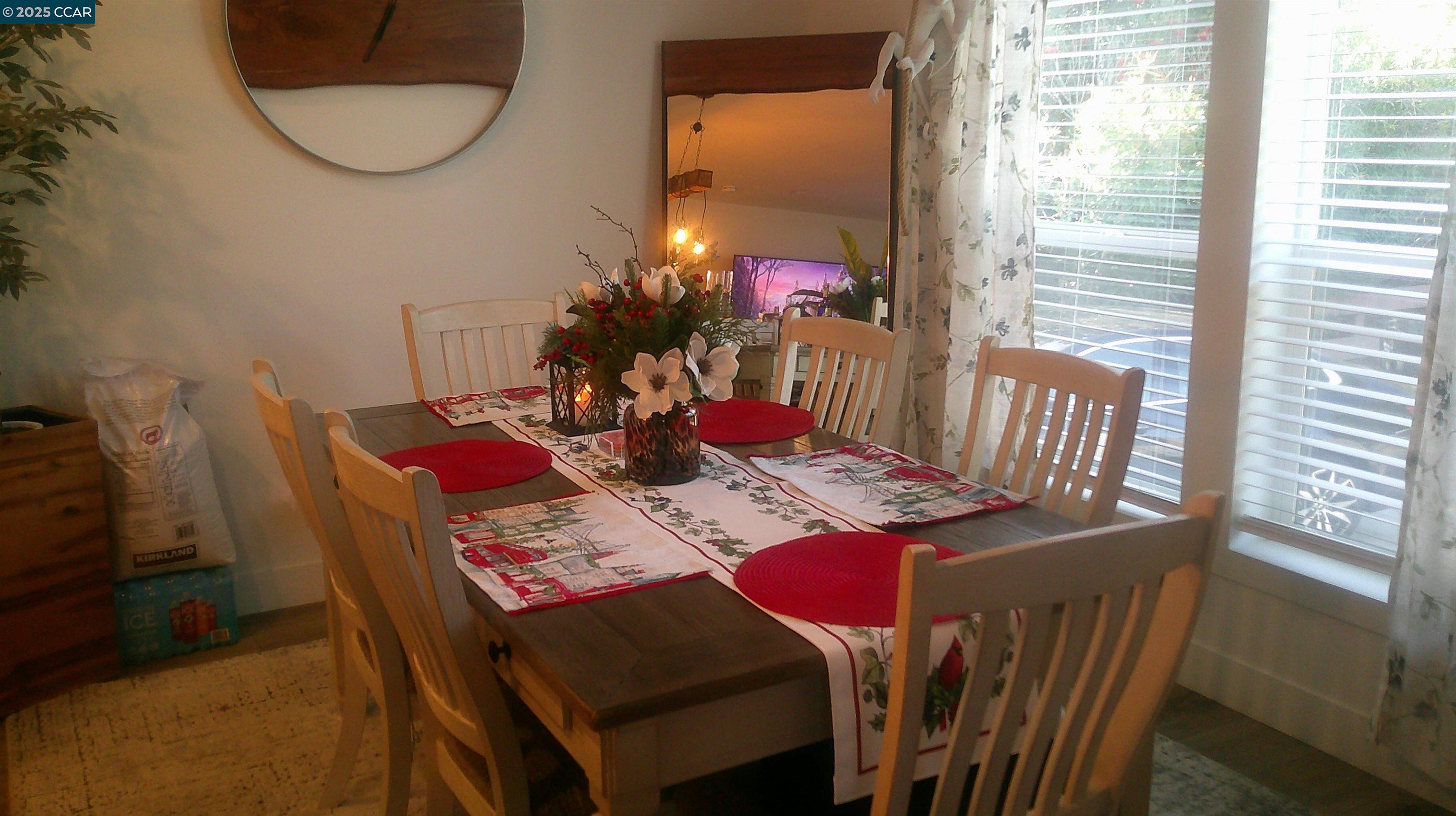 16711 Marsh Creek Road, Unit 161 Clayton, CA 94517 - Photo 2 of 25 a view of a dining room with furniture window and wooden floor