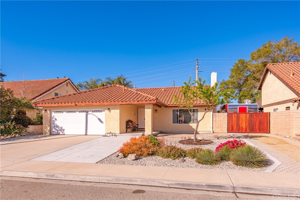 4825 Avedon Road Moorpark, CA 93021 - Photo 1 of 1 a front view of a house with a yard
