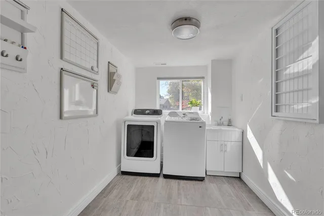 a kitchen with stainless steel appliances a white stove top oven and a refrigerator