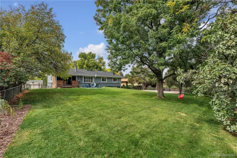 a view of a house with a big yard