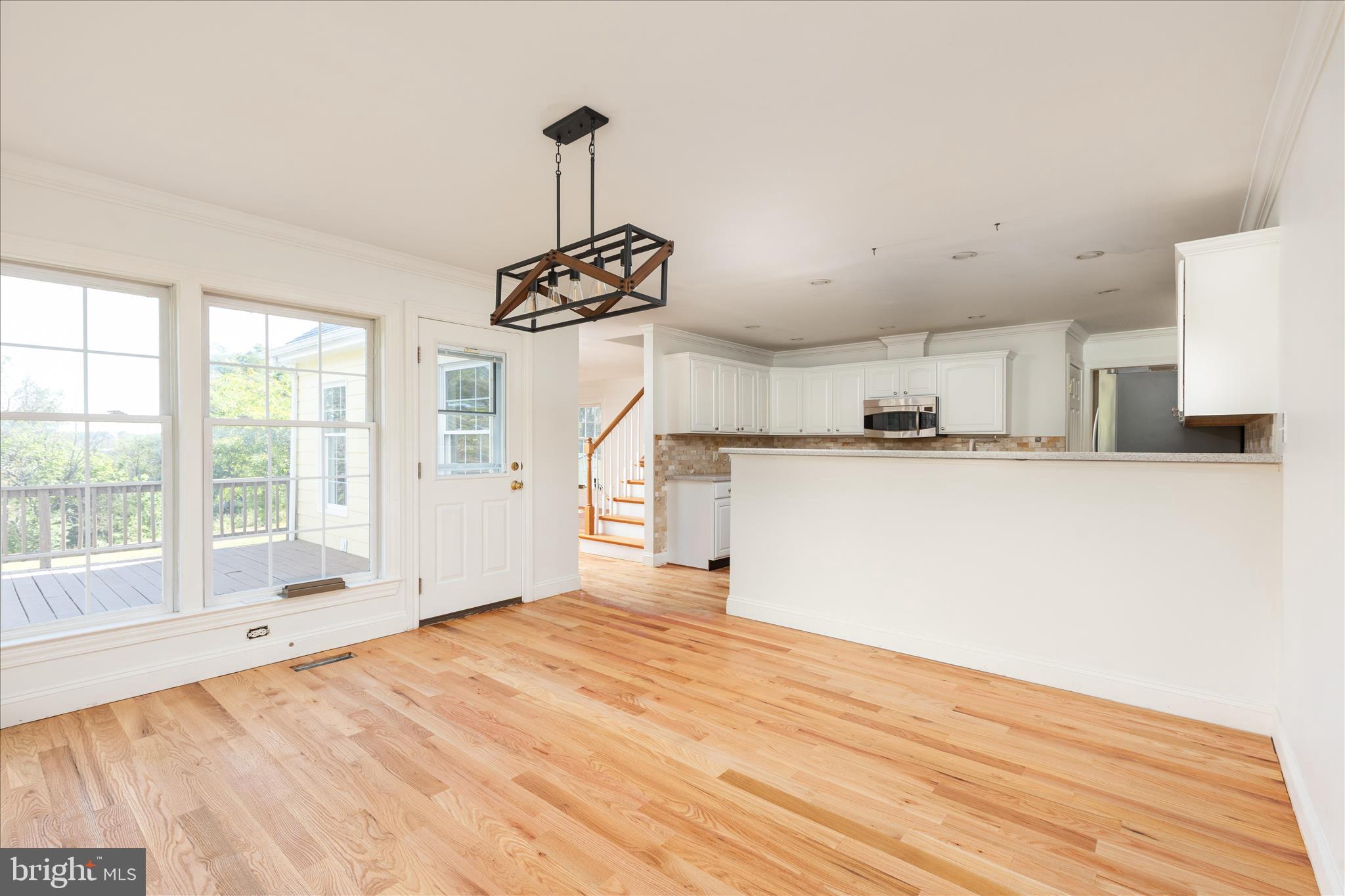 1200 Salem Church Road Stephens City, VA 22655 - Photo 15 of 69 a view of a kitchen with a sink dishwasher and a wooden floor