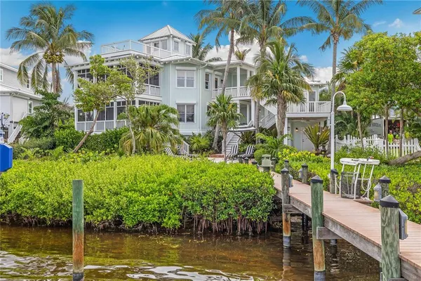 a view of a lake with a building in the background