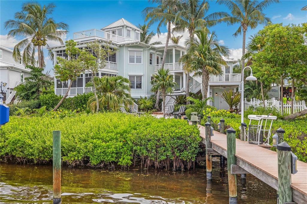 13310 Anglers Way Placida, FL 33946 - Photo 36 of 43 a view of a lake with a building in the background