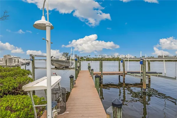 a house with lots of trees in the background