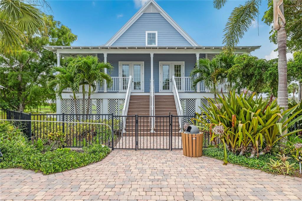 13310 Anglers Way Placida, FL 33946 - Photo 40 of 43 a front view of a house with a garden